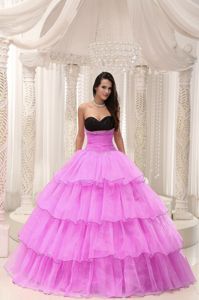 Rose Pink and Black Quinceanera Gown Dress with Ruffled Layers