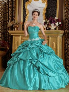 Fashionable Ruched and Beaded Dresses for a Quince with Pick-ups
