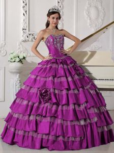 Fuchsia Sweetheart Quinceanera Dress with Ruffled Layers Appliques