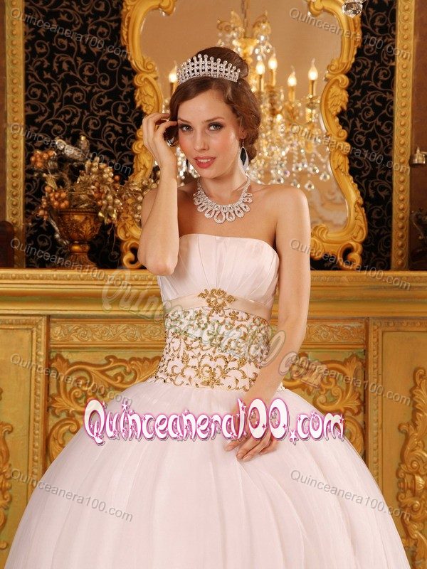 light pink and gold quinceanera dresses