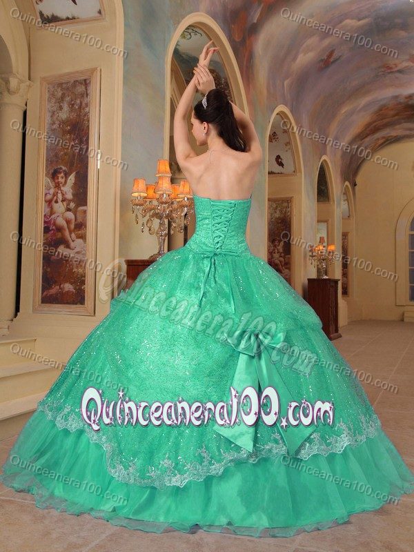 Fashionable Green Dresses for a Quince with Sequins and Bowknots