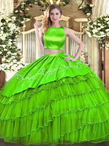 Sleeveless Tulle Floor Length Criss Cross Quinceanera Gown in with Embroidery and Ruffled Layers