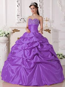 Purple Dresses For a Quinceanera with Colorful Beads and Pleats