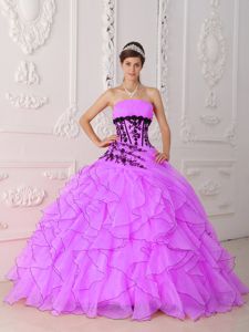 Strapless Ruffled Organza Quinceanera Dress with Black Appliques