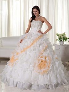 Gorgeous White Ruffled Sweet 15 Dress with Orange Flowers