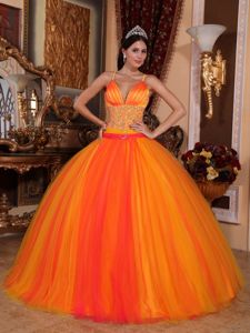 Orange Spaghetti Straps Beading Dresses for a Quinceanera in Tulle