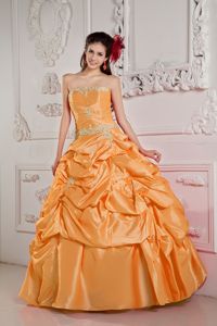 Popular Orange Strapless Beading Dress for Quince with Pick-ups