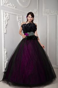 Black and Fuchsia Quince Dresses with Feather and Sash Accent