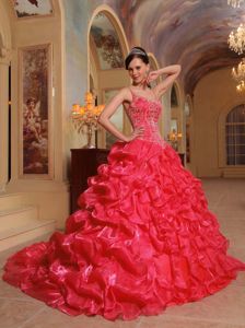 2014 Coral Red Straps Appliques Dress for a Quince with Pick-ups