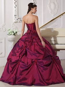 Sweetheart Burgundy Quinceanera Dress with Pick-ups and Appliques