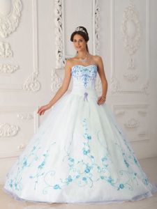 Dignified White Quinceanera Dress with Blue Floral Embroidery