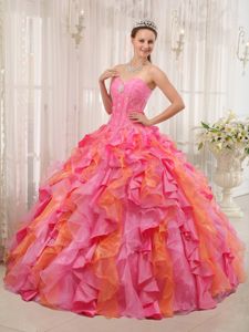 Beaded and Ruffled Dress for a Quinceanera in Orange and Rose Pink