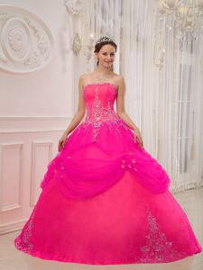Hot Pink Quinceanera Dress with Strapless Neckline and Layered Skirt