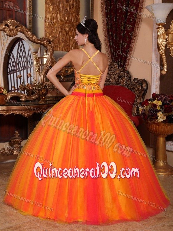 Orange Spaghetti Straps Beading Dresses for a Quinceanera in Tulle
