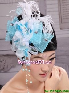Feather and Rhinestones Decorate Aqua Blue Headpieces