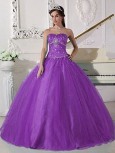 Beaded Strapless Floor-length Ruched Quinceanera Dress in Purple