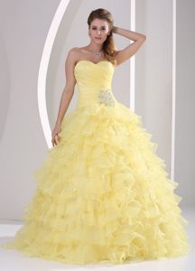 Light Yellow Appliques and Ruching Quinceaneras Gowns with Ruffles