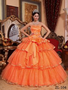 Classy Ruffled Orange Red Dress for Sweet 15 with Big Bowknot
