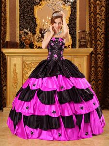 Black and Hot Pink Strapless Tiered Quinceanera Dress with Patterns