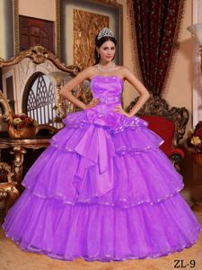 Light Purple Strapless Bow Multi-tiered Dresses for a Quinceanera
