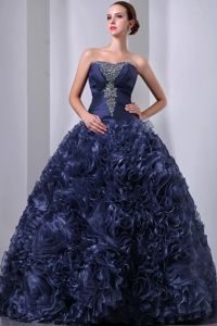 Navy Blue A-line Beaded Quinceanera Dress with Rolling Flowers