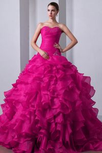 Expensive Fuchsia A-line Ruffled Beaded Quinceanera Gowns