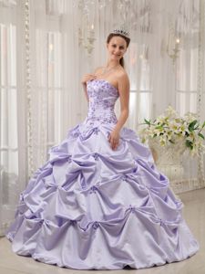 Elegant Lilac Pic-ups Strapless Dresses for a Quince with Appliques