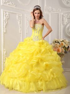 Yellow Organza Quinceanera Gown with Strapless Neck and Beaded Top
