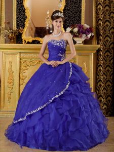 Deep Purple Strapless Quinceanera Dress with Appliques and Ruffled Skirt
