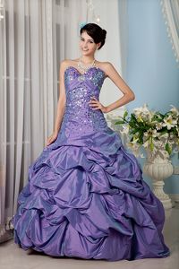 Beaded Sweetheart Dress for a Quinceanera with Pick-ups