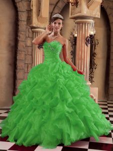 Ruched and Beaded Green Organza Dresses for A Quince with Ruffles