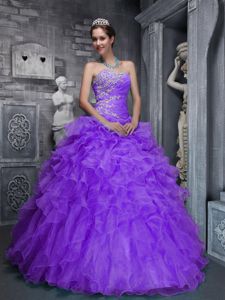 Light Purple Beading and Appliqued Quince Dresses with Ruffles