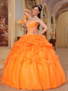 Orange Sweetheart Dresses for A Quince with Pick ups and Appliques