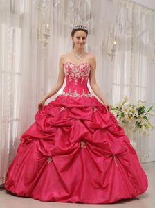 Sweetheart Coral Red Quinceanera Gown with Ruffles and Appliques