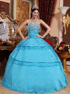 Beaded Aqua Blue Quinceanera Gown with Organza Layer and Embroidery