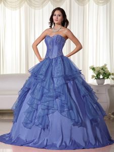 Sweetheart Beaded Blue Quinceanera Gown with Ruffles and Embroidery
