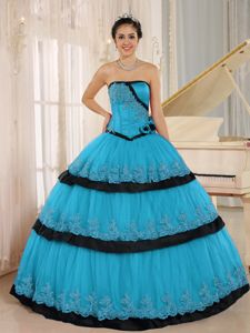 Aqua Blue and Black Quinces Dresses with Lace Hem and Flowers