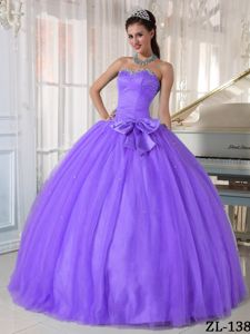 Purple Beaded Ball Gown Quinceanera Dress with Bowknot
