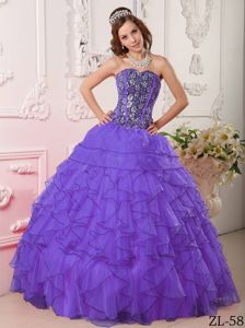 Purple Sweetheart Beaded Quinceanera Dress with Ruffled Skirt