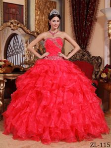 Red Sweetheart Quinceanera Dress in with Beading and Ruffles