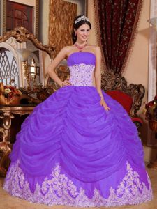 Purple Strapless Quinceanera Gown with Ruffled Layered Skirt and Appliques