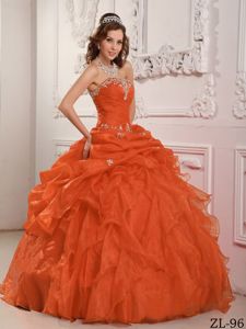 Orange Red Ruffled Dress for Quince with Appliques and Pick-ups