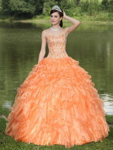 Best Orange Ruffled Layers Strapless Quinceanera Gown with Beading