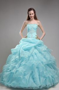 Light Baby Blue Strapless Beading Quinceanera Gowns with Ruffled Layers